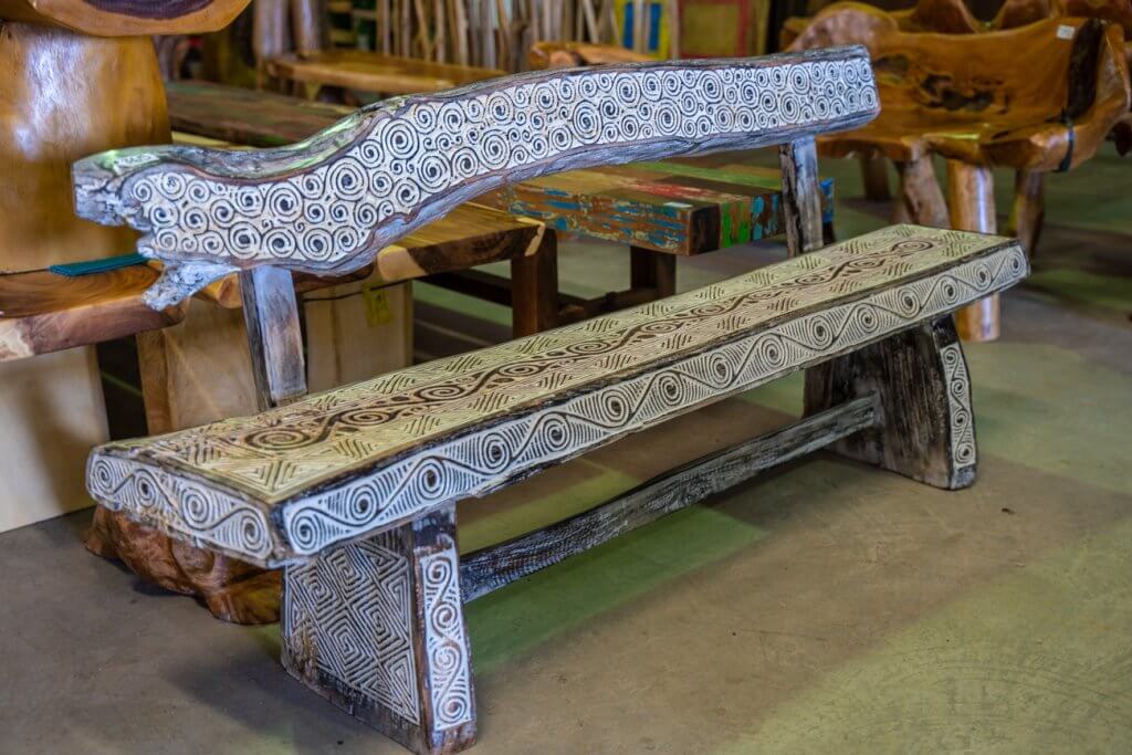 carved wooden outside bench