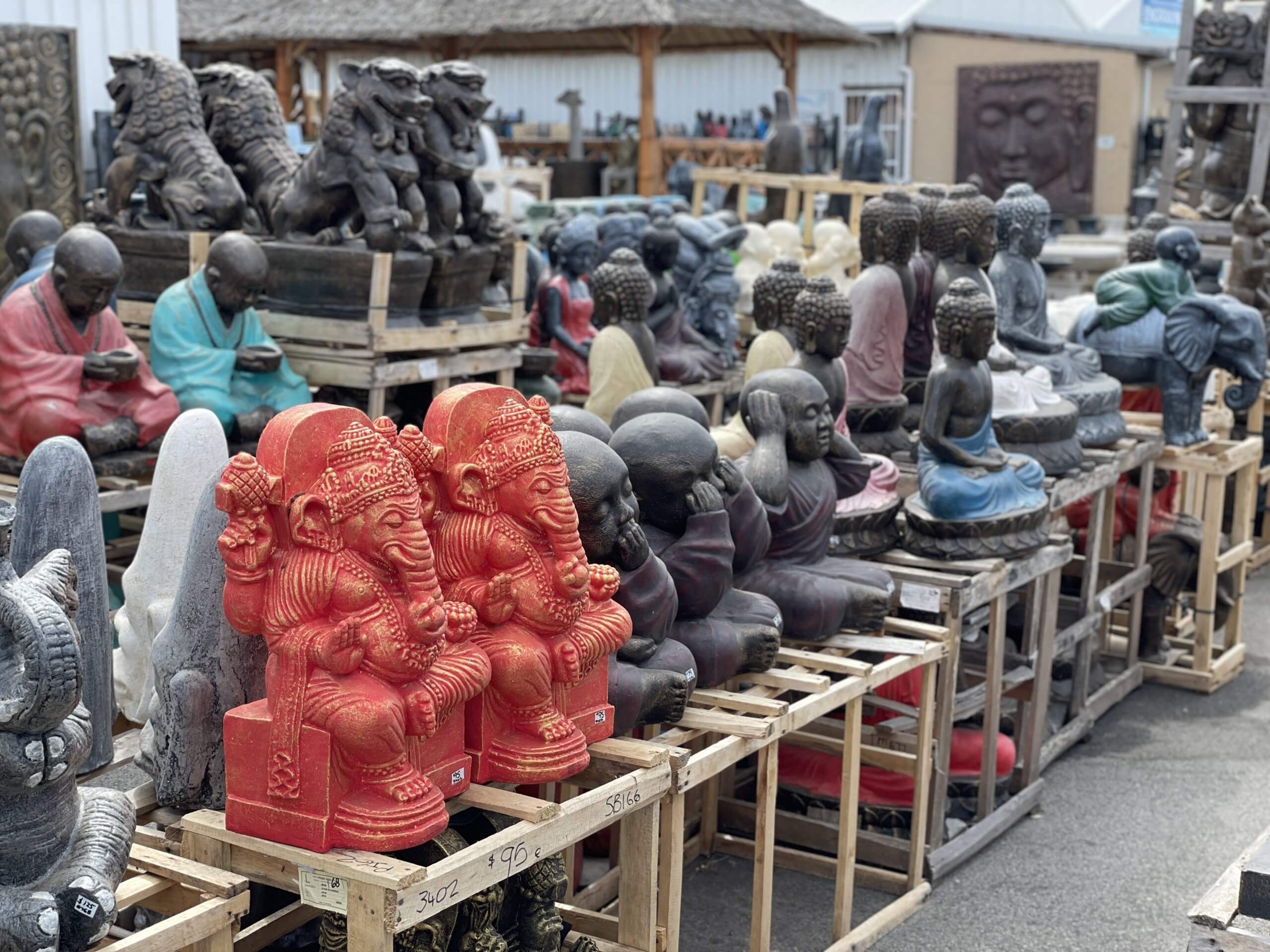 selection of different brightly coloured garden ornaments available from prime liquidations